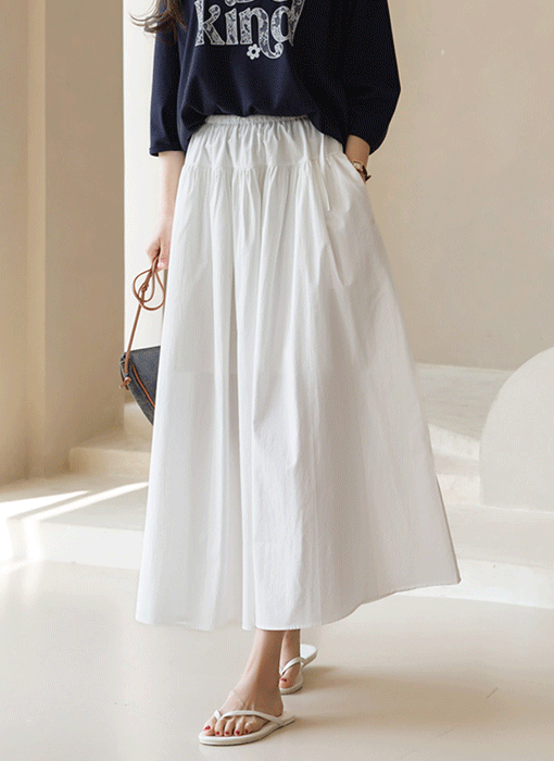 [Theonme] 플레온 허리 스트링 리본 셔링 A라인 플레어 면 롱 스커트